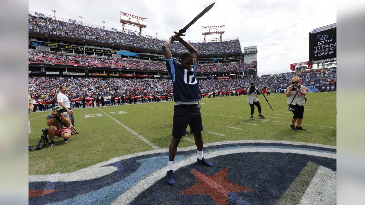 The Sword of Honor is moved to the field before the first half of an NFL  football game between the Tennessee Titans and the Jacksonville Jaguars,  Thursday, Dec. 6, 2018, in Nashville