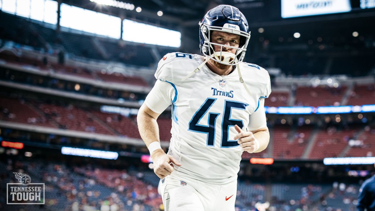 Tennessee Titans long snapper Morgan Cox (46) celebrates as he runs off the  field after the team's NFL football game against the Green Bay Packers,  Thursday, Nov. 17, 2022, in Green Bay