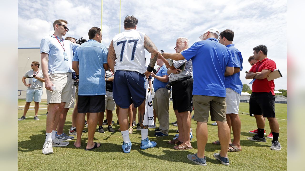 Tennessee Titans tackle Taylor Lewan (77) warms up during training camp at  the NFL football team's practice facility Wednesday, July 27, 2022, in  Nashville, Tenn. (AP Photo/Mark Humphrey Stock Photo - Alamy