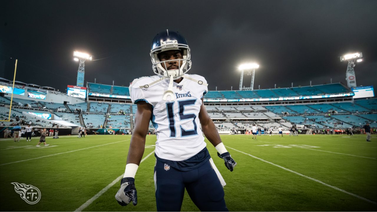 Tennessee Titans vs. Jacksonville Jaguars. Fans support on NFL Game.  Silhouette of supporters, big screen with two rivals in background Stock  Photo - Alamy