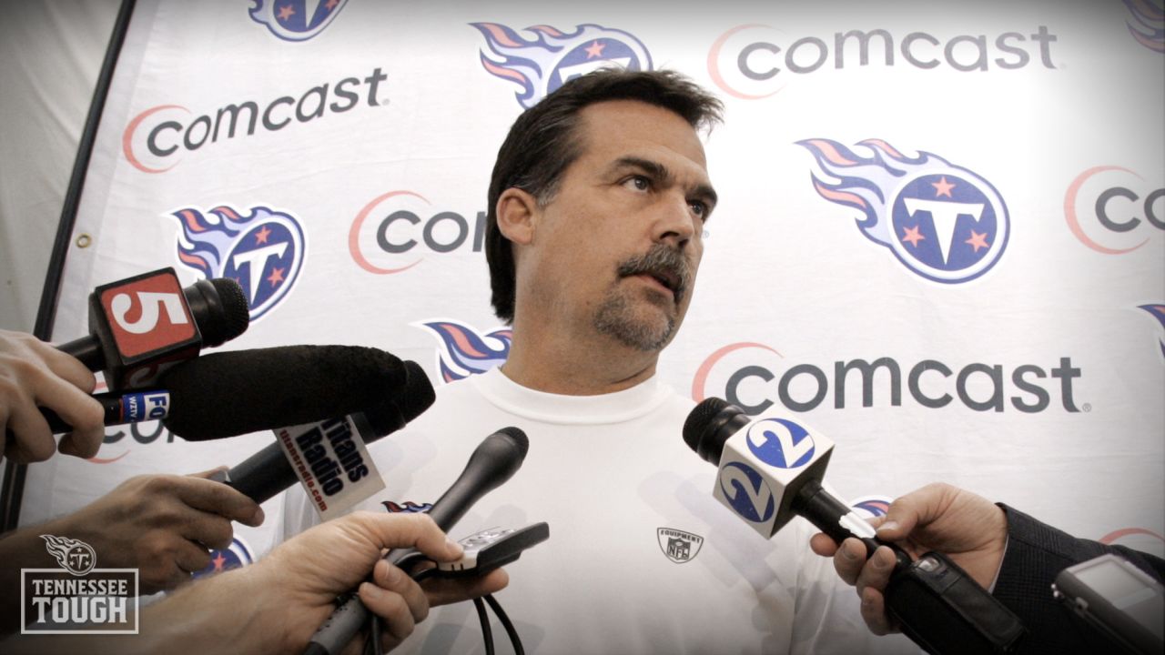 Head coach Mike Vrabel of the AFC helps put a microphone on Justin News  Photo - Getty Images