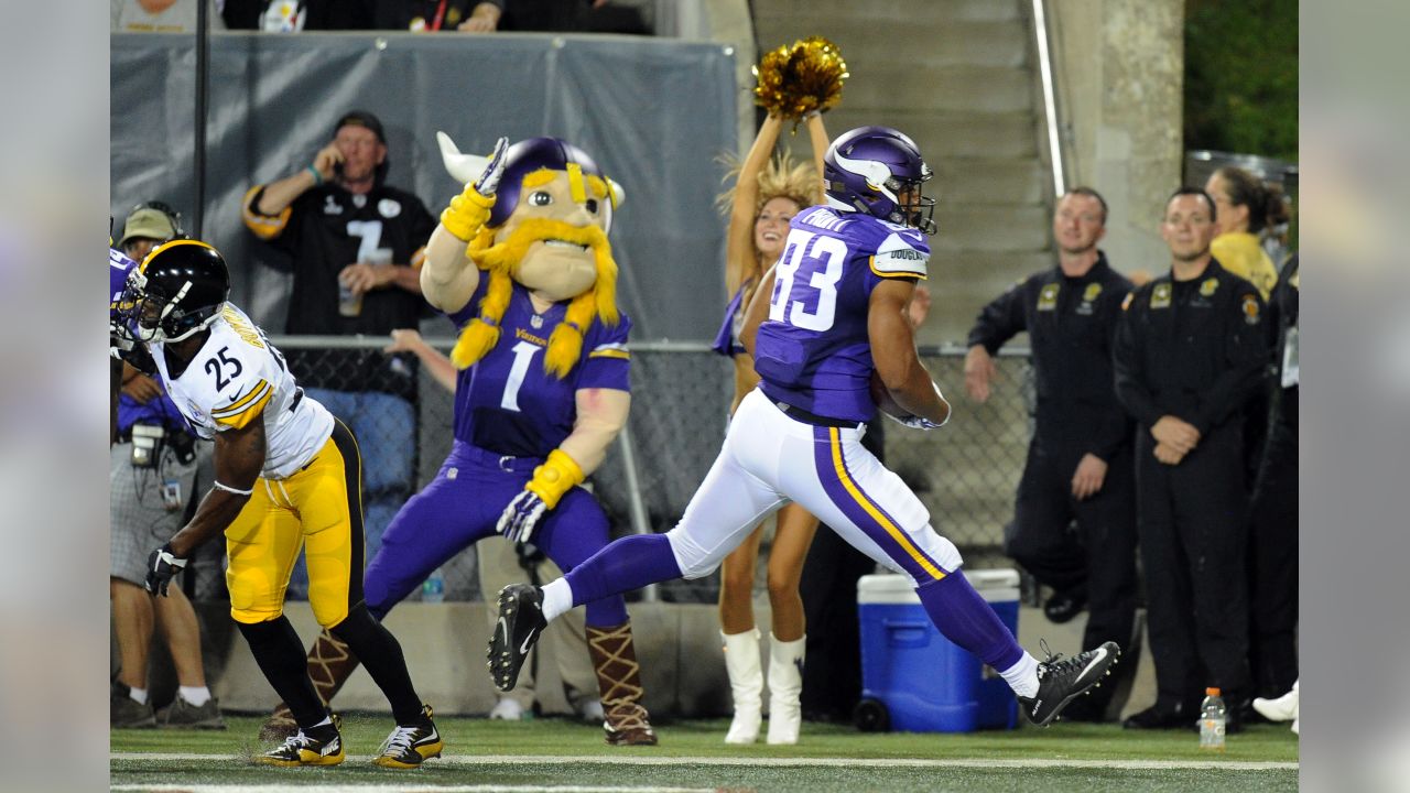 Minnesota Vikings mascot Viktor the Vikings displays his gloves