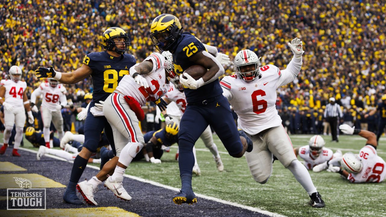 Former Michigan RB Hassan Haskins puts on Titans uniform at Panini's NFLPA  Rookie Premiere 