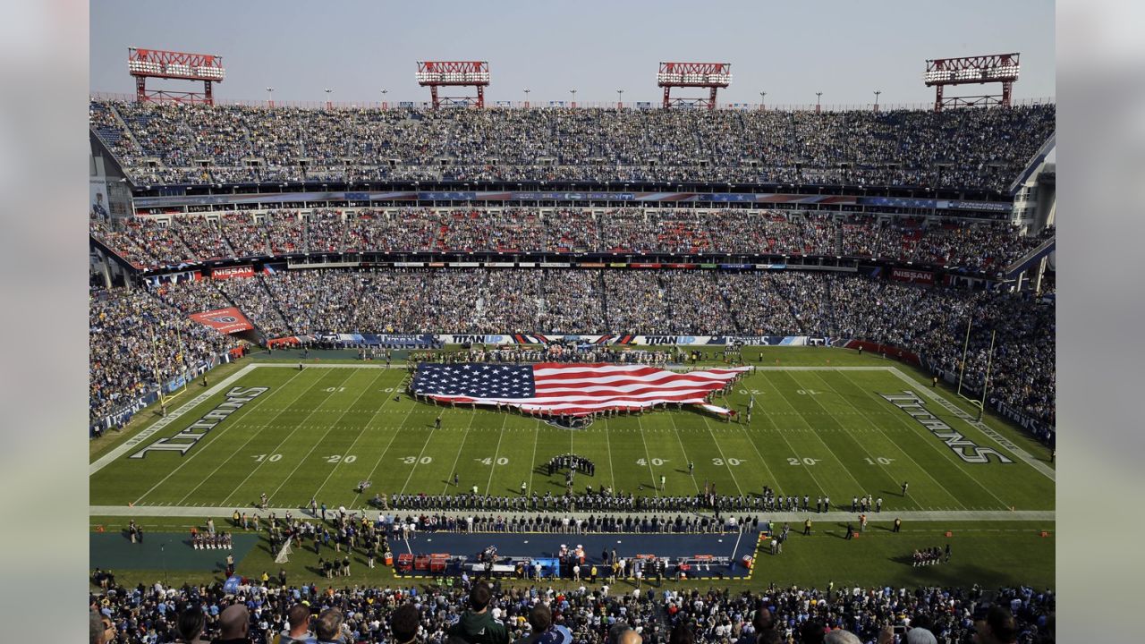 Helicopters fly over Nissan Stadium during Salute to Service