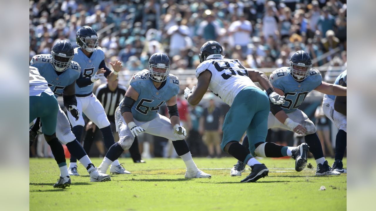 Minnesota Vikings offensive guard Josh Kline (64) sets to block