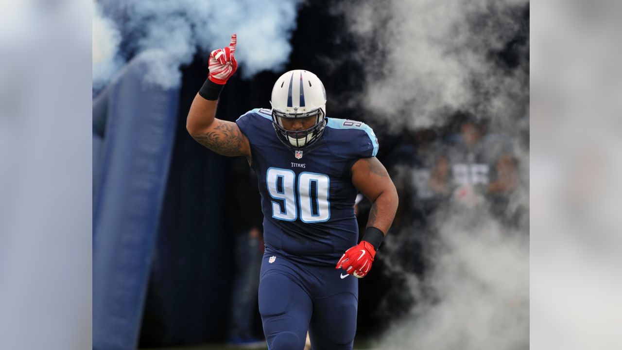 Tennessee Titans defensive end DaQuan Jones (90) sits on the bench