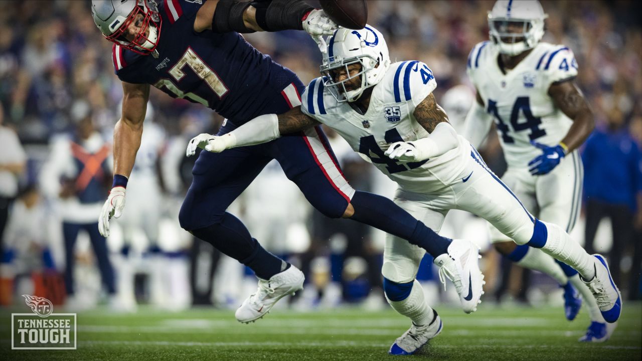 UPDATES TO INTERCEPTION, INSTEAD OF FUMBLE – Indianapolis Colts defensive  back Matthias Farley (41) and New England Patriots tight end Rob Gronkowski  (87) compete for a pass during the second half …