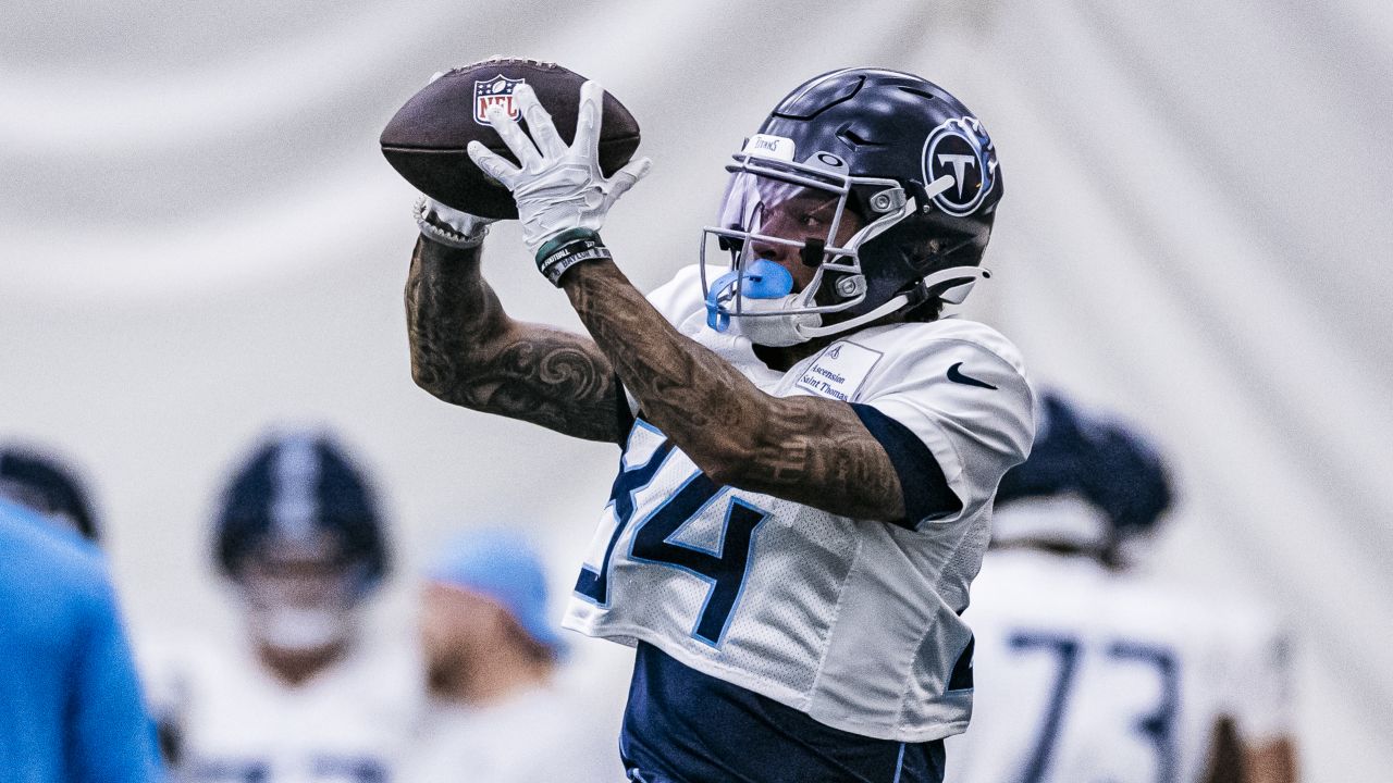 Tennessee Titans running back Derrick Henry (22) stretches during practice  at the NFL football team's training facility Wednesday, June 7, 2023, in  Nashville, Tenn. (AP Photo/George Walker IV Stock Photo - Alamy