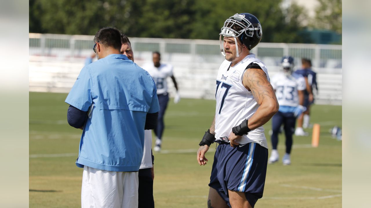 Tennessee Titans tackle Taylor Lewan (77) warms up during training camp at  the NFL football team's practice facility Wednesday, July 27, 2022, in  Nashville, Tenn. (AP Photo/Mark Humphrey Stock Photo - Alamy