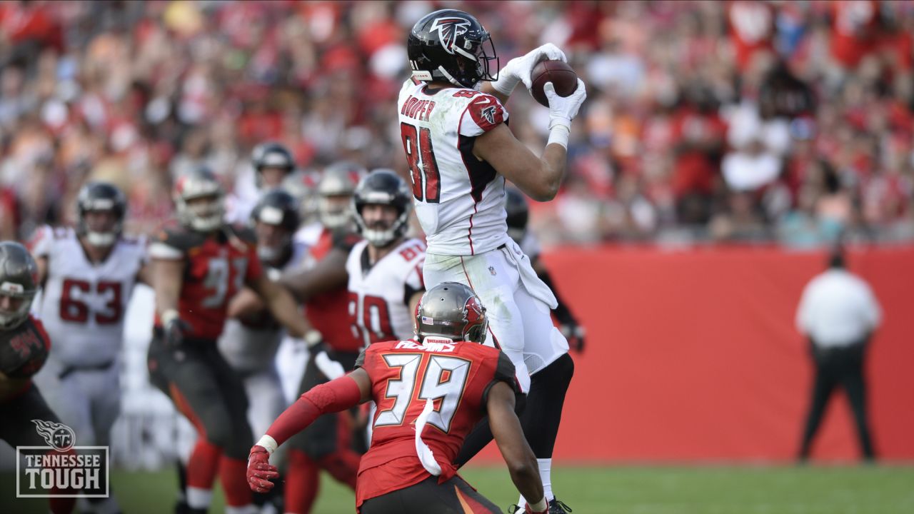 Atlanta Falcons tight end Austin Hooper (81) runs the ball after a