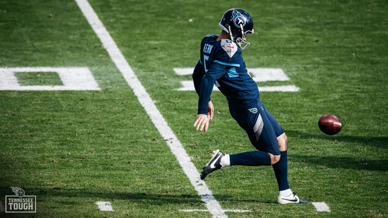 Tennessee Titans punter Brett Kern (6) kicks the ball against the