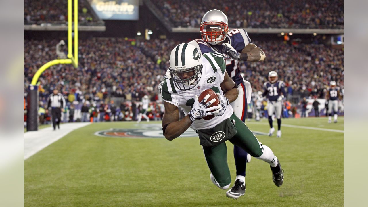 14 September 2009. Patriot Wide Receiver Randy Moss (81) runs following one  of twelve catches on the evening. This one in the second quarter. The New  England Patriots defeated the Buffalo Bills