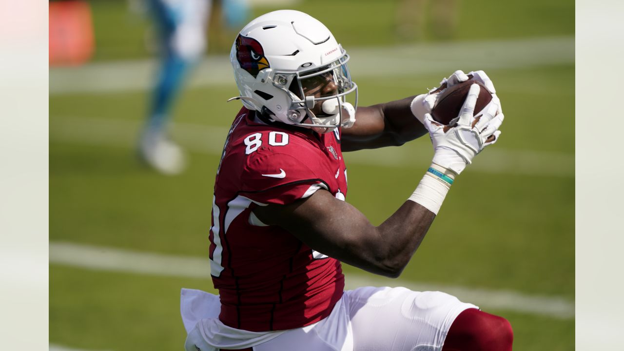 Carolina Panthers running back Mike Davis (28) is wrapped up by Arizona  Cardinals linebacker Isaiah Simmons (48) during an NFL football game,  Sunday, Oct. 4, 2020, in Charlotte, N.C. (AP Photo/Brian Westerholt