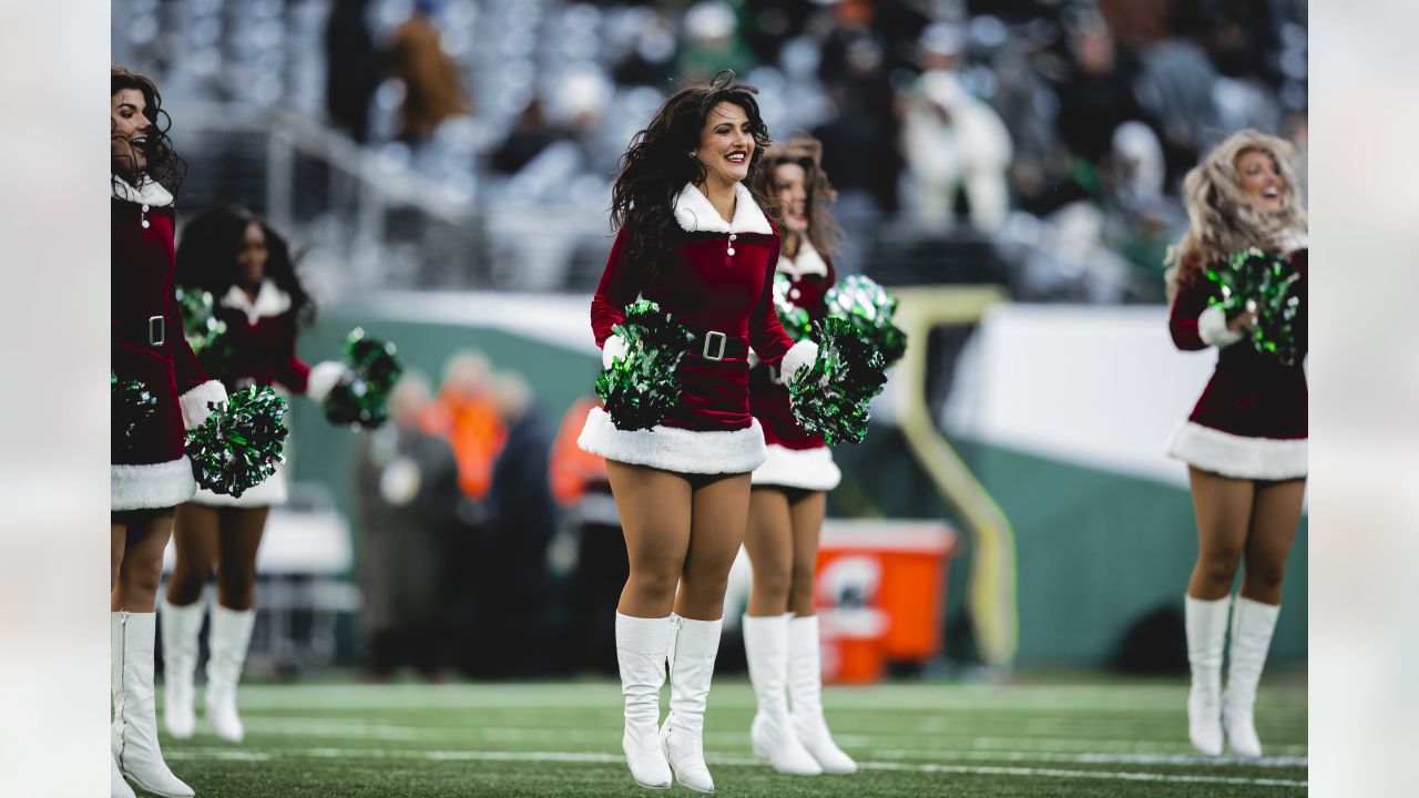 The Jets Flight Crew cheerleaders pump up fans for Monday night's game