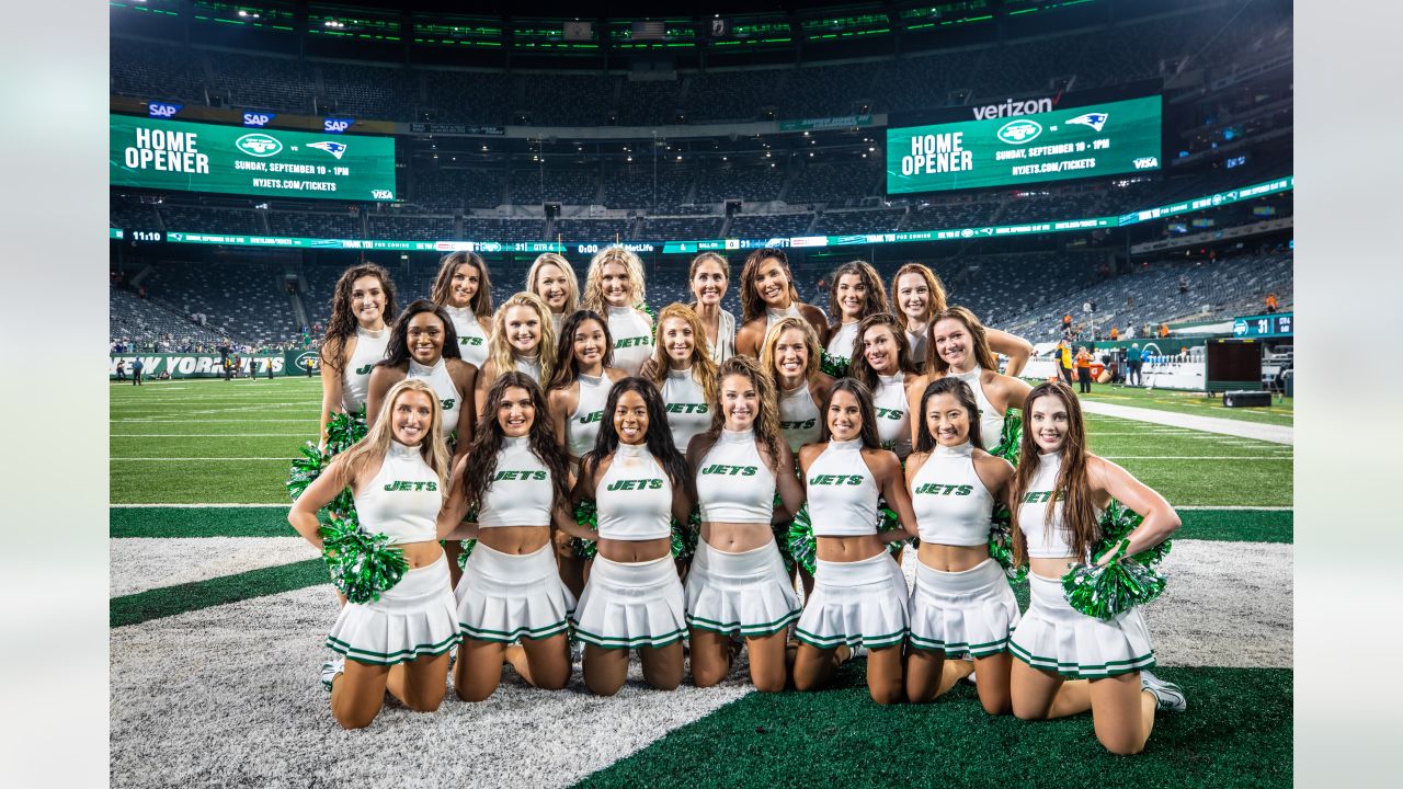 The Jets Flight Crew cheerleaders pump up fans for Monday night's game