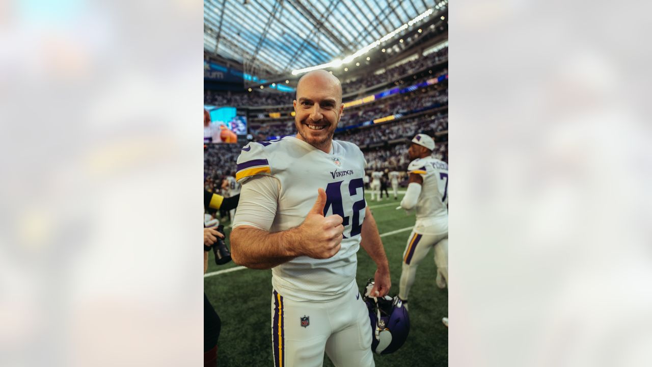 Minnesota Vikings punter Ryan Wright (14) and long snapper Andrew DePaola  (42) chat as they warm-up before an NFL match between Minnesota Vikings and  New Orleans Saints at the Tottenham Hotspur stadium