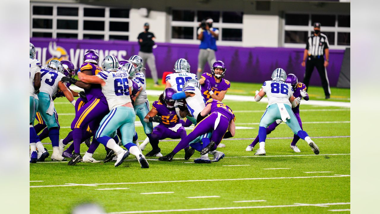 Minnesota Vikings vs. Dallas Cowboys . NFL Game. American Football League  match. Silhouette of professional player celebrate touch down. Screen in  bac Stock Photo - Alamy