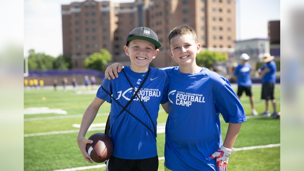 Nearly 500 kids show up for Kirk Cousins football camp