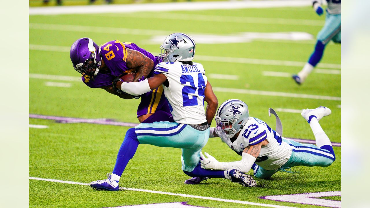 Minnesota Vikings vs. Dallas Cowboys . NFL Game. American Football League  match. Silhouette of professional player celebrate touch down. Screen in  bac Stock Photo - Alamy