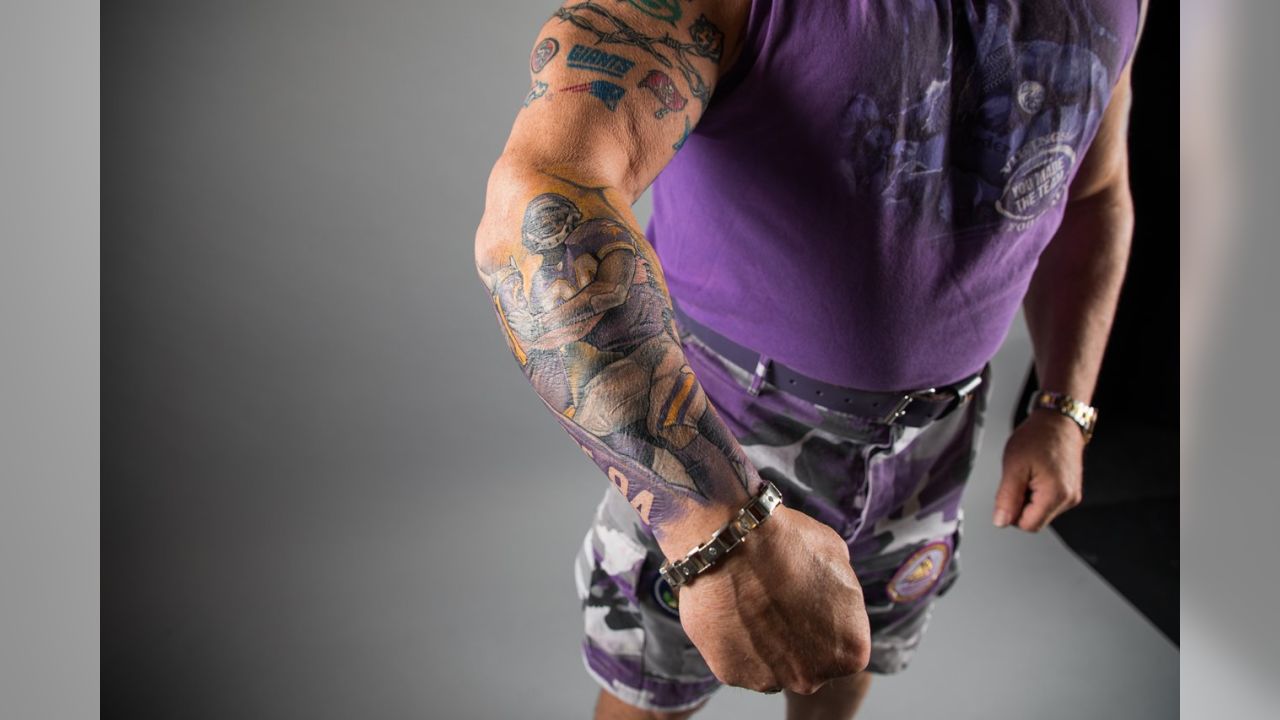 Minnesota Vikings Fan Shows Off Morbid Rival Tattoos In Video