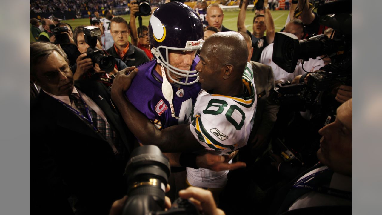 Minnesota Vikings' Brett Favre is shown with his offensive line against the  Green Bay Packers in an NFL game, Sunday, Nov. 1, 2009, in Green Bay, Wis.  The Vikings won 38-26. (AP