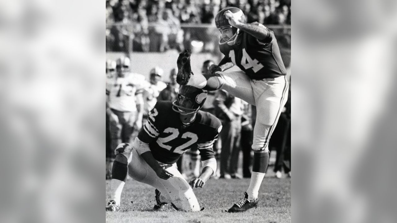 Circa 1998: Paul Krause formerly of the Minnesota Vikings and the  Washington Redskins rubs the head of his bust after being inducted into the  Pro Football Hall of Fame in Canton, Ohio.