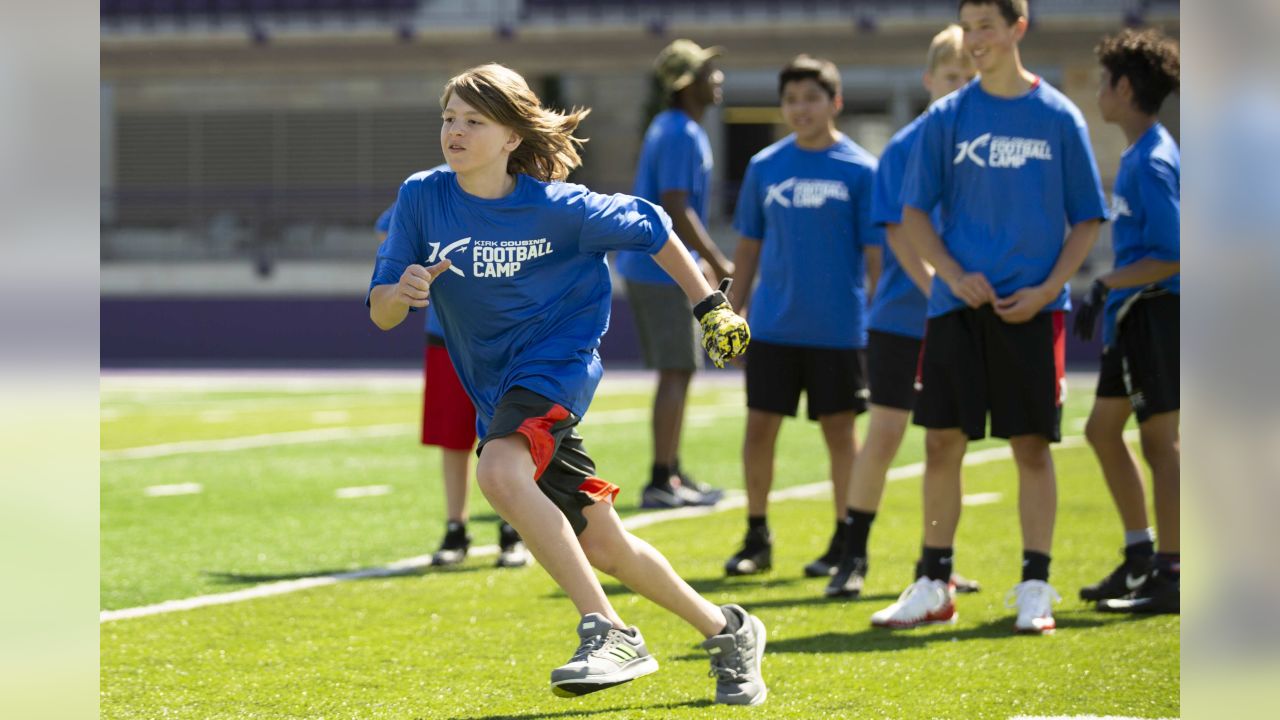 Nearly 500 kids show up for Kirk Cousins football camp