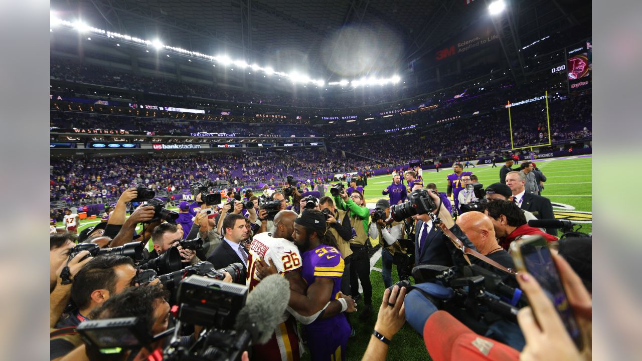 Fox sideline reporter Erin Andrews interviews Minnesota Vikings running  back Dalvin Cook, left, after an NFL football game against the Washington  Redskins, Thursday, Oct. 24, 2019, in Minneapolis. The Vikings won 19-9. (