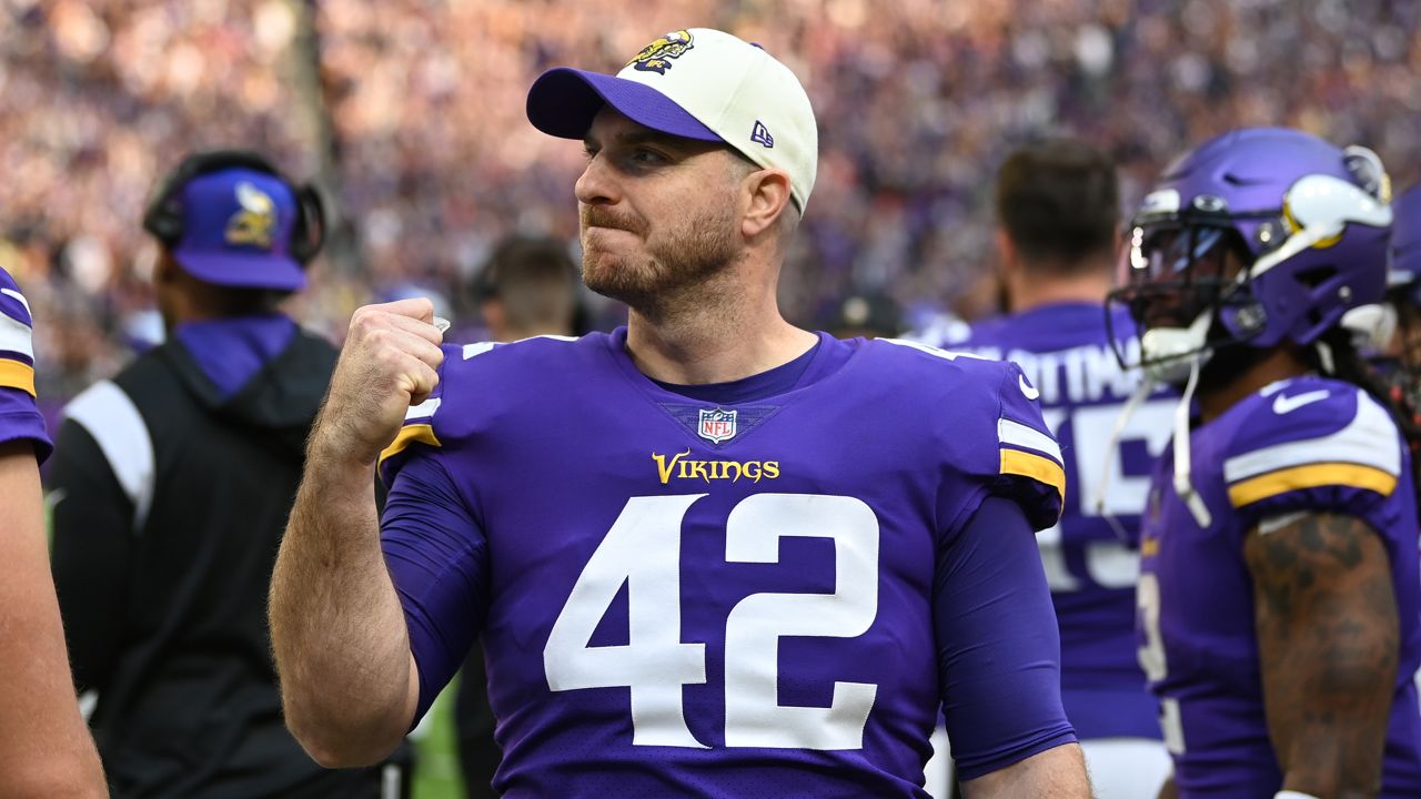 Minnesota Vikings punter Ryan Wright (14) and long snapper Andrew DePaola  (42) chat as they warm-up before an NFL match between Minnesota Vikings and  New Orleans Saints at the Tottenham Hotspur stadium