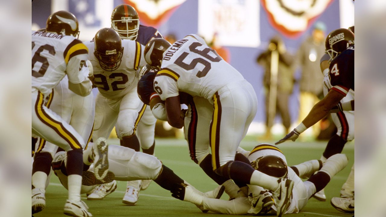 Former Minnesota Vikings' Chris Doleman prepares to blow a Vikings horn  before an NFL football game between the Minnesota Vikings and the Green Bay  Packers Sunday, Oct. 23, 2011, in Minneapolis. (AP