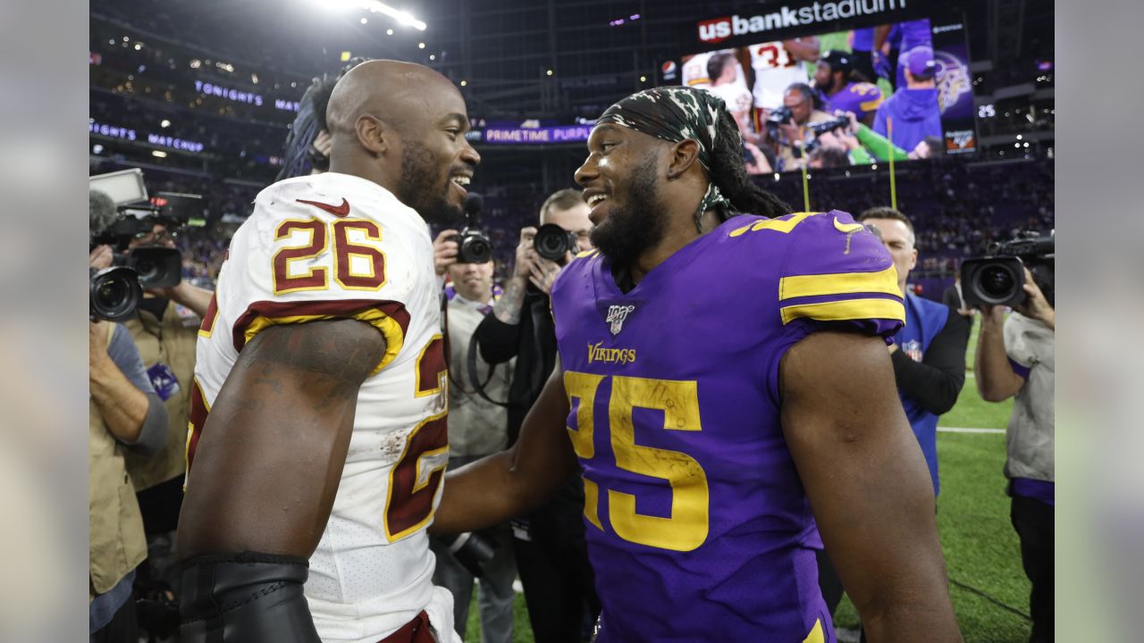 Fox sideline reporter Erin Andrews interviews Minnesota Vikings running  back Dalvin Cook, left, after an NFL football game against the Washington  Redskins, Thursday, Oct. 24, 2019, in Minneapolis. The Vikings won 19-9. (