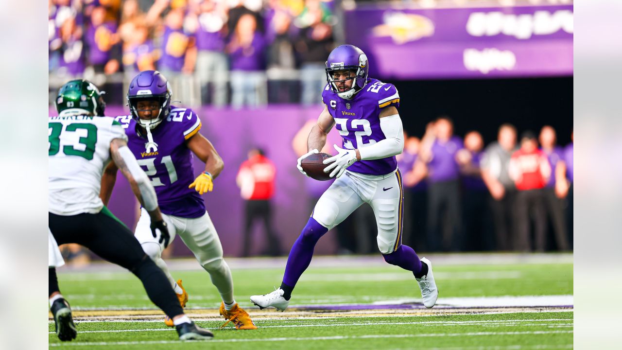 Minnesota Vikings wide receivers Justin Jefferson (18) and Adam Thielen  (19) celebrate after Jefferson scored a touchdown against the New York  Jets, during the second half of an NFL football game Sunday