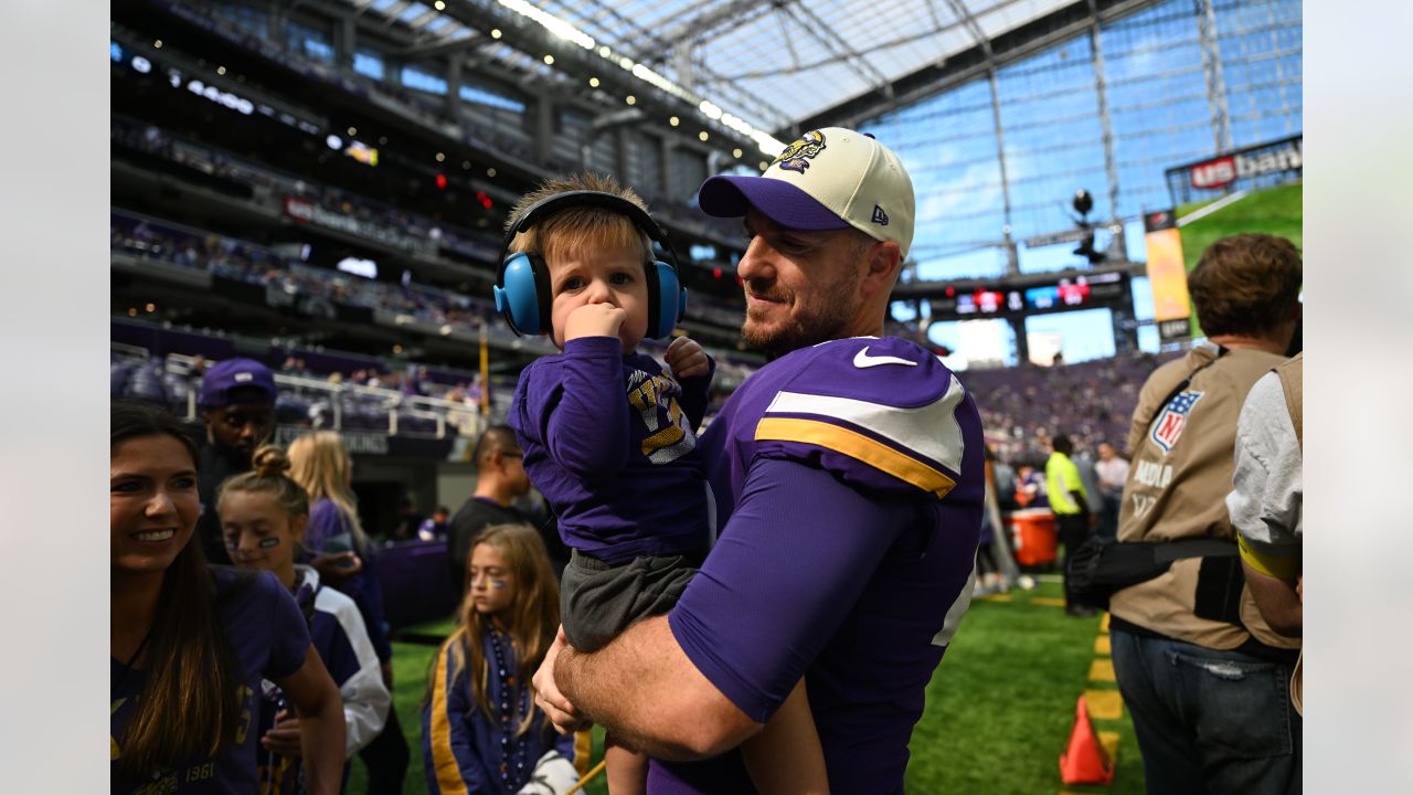 Minnesota Vikings punter Ryan Wright (14) and long snapper Andrew DePaola  (42) chat as they warm-up before an NFL match between Minnesota Vikings and  New Orleans Saints at the Tottenham Hotspur stadium