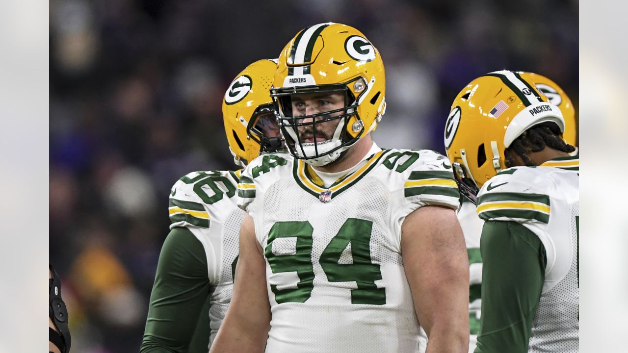 Green Bay Packers defensive end Dean Lowry (94) is blocked by