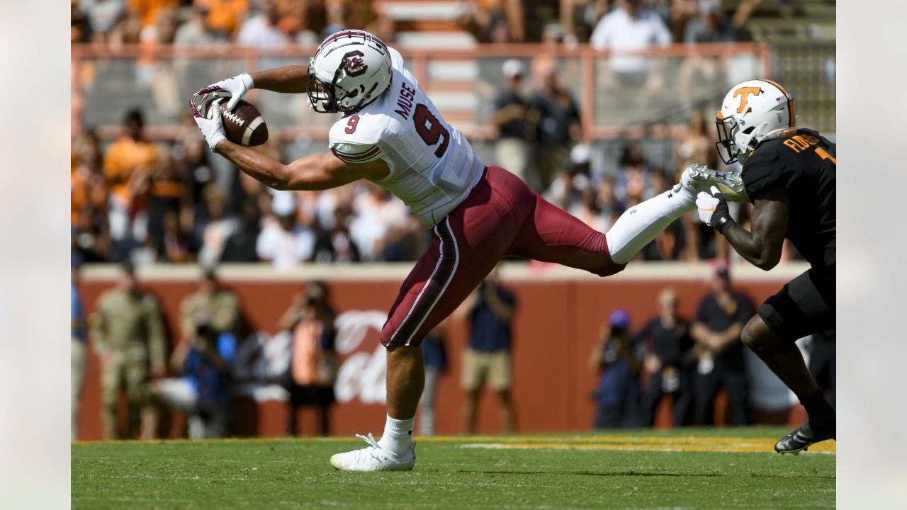 Minnesota Vikings tight end Nick Muse, top, catches a touchdown