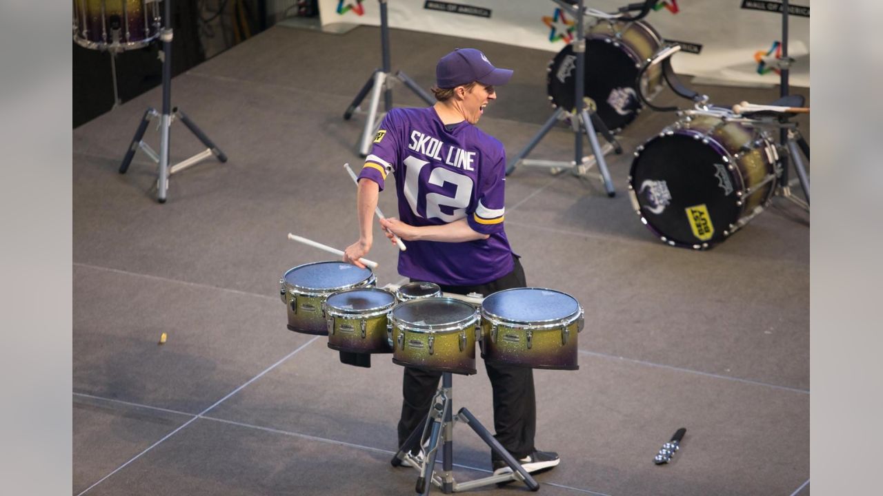 A member of the Minnesota Vikings Skol Line bangs a drum before the News  Photo - Getty Images