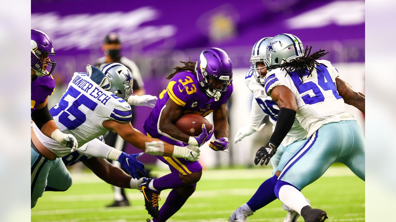 Minnesota Vikings vs. Dallas Cowboys . NFL Game. American Football League  match. Silhouette of professional player celebrate touch down. Screen in  bac Stock Photo - Alamy