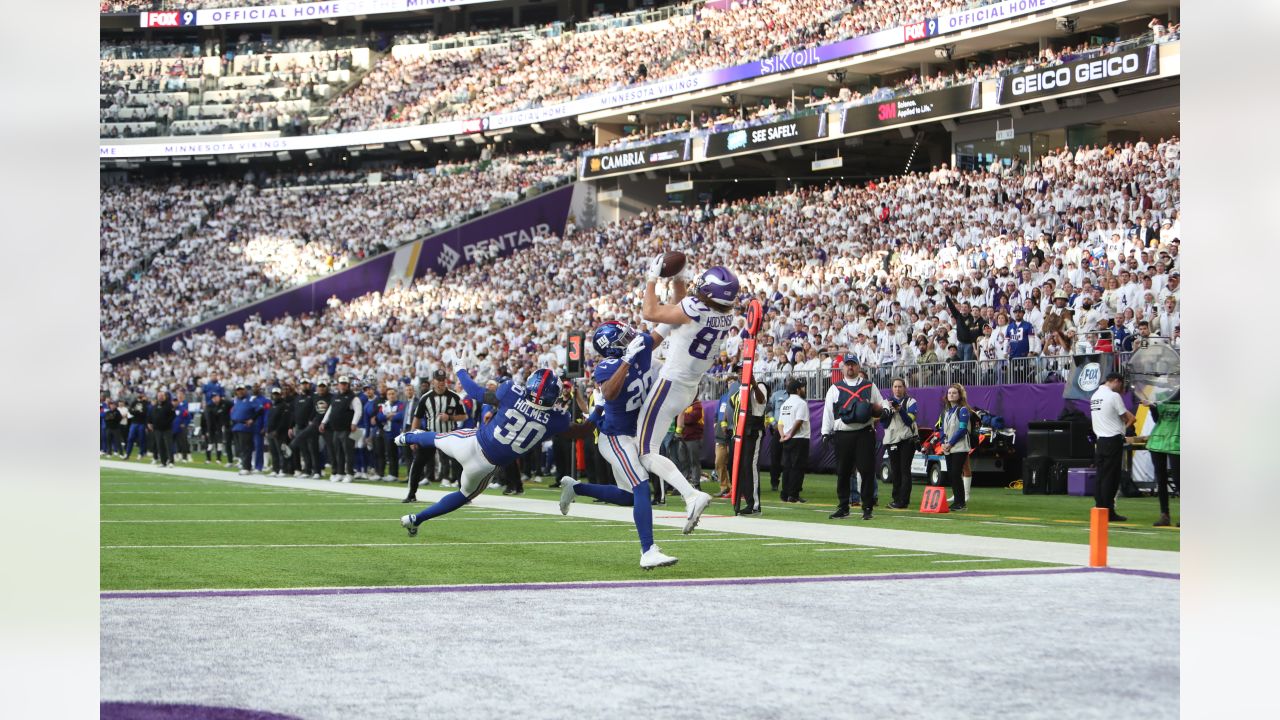 Minnesota Vikings tight end T.J. Hockenson (87) celebrates after catching a  pass during the first half of an NFL wild card playoff football game  against the New York Giants, Sunday, Jan. 15