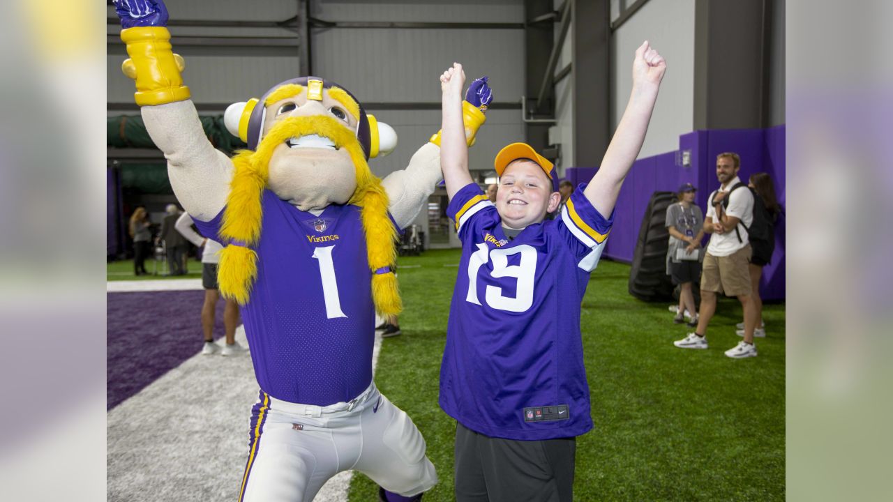 Minnesota Vikings mascot Viktor the Vikings displays his gloves