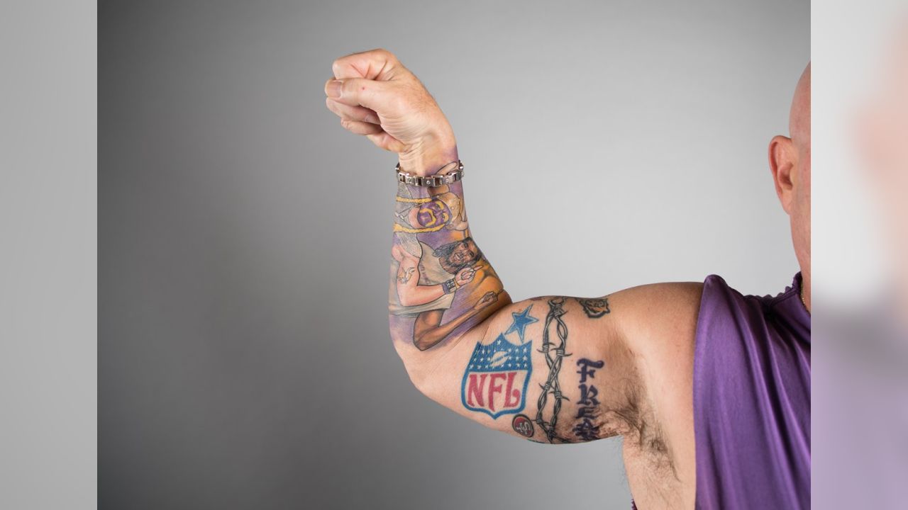 Minnesota Vikings Fan Shows Off Morbid Rival Tattoos In Video