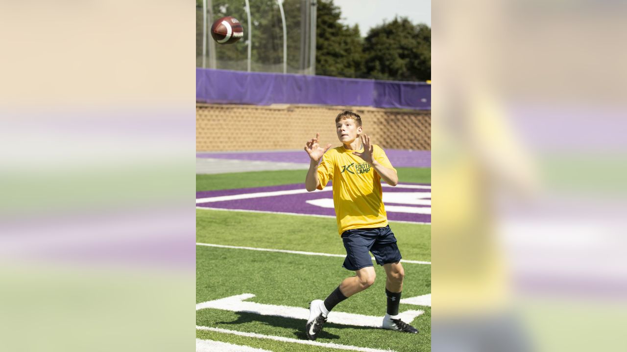 Photos: Kirk Cousins holds 7th annual football camp at Hope