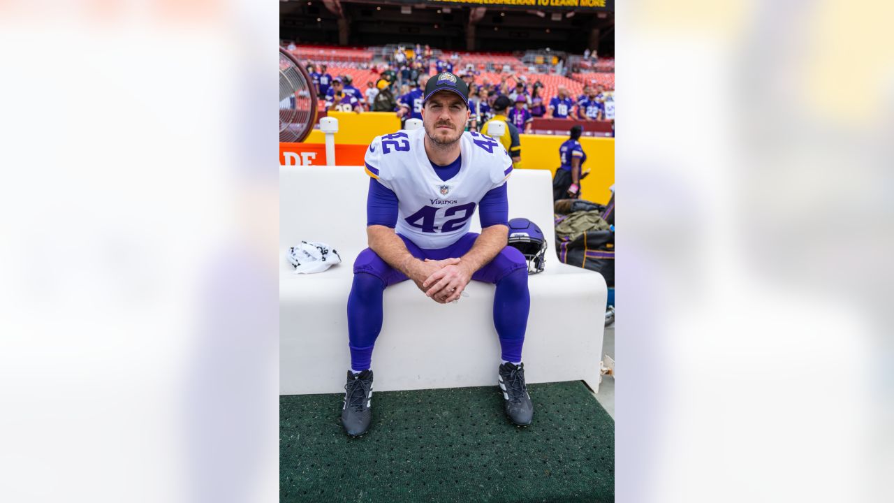 Minnesota Vikings punter Ryan Wright (14) and long snapper Andrew DePaola  (42) chat as they warm-up before an NFL match between Minnesota Vikings and  New Orleans Saints at the Tottenham Hotspur stadium