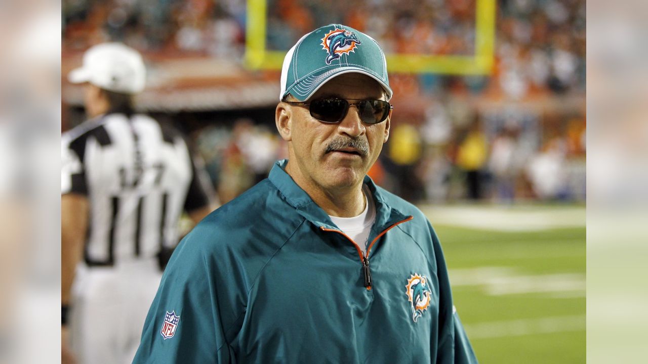 Miami Dolphins coach Tony Sparano, right, watches a replay against