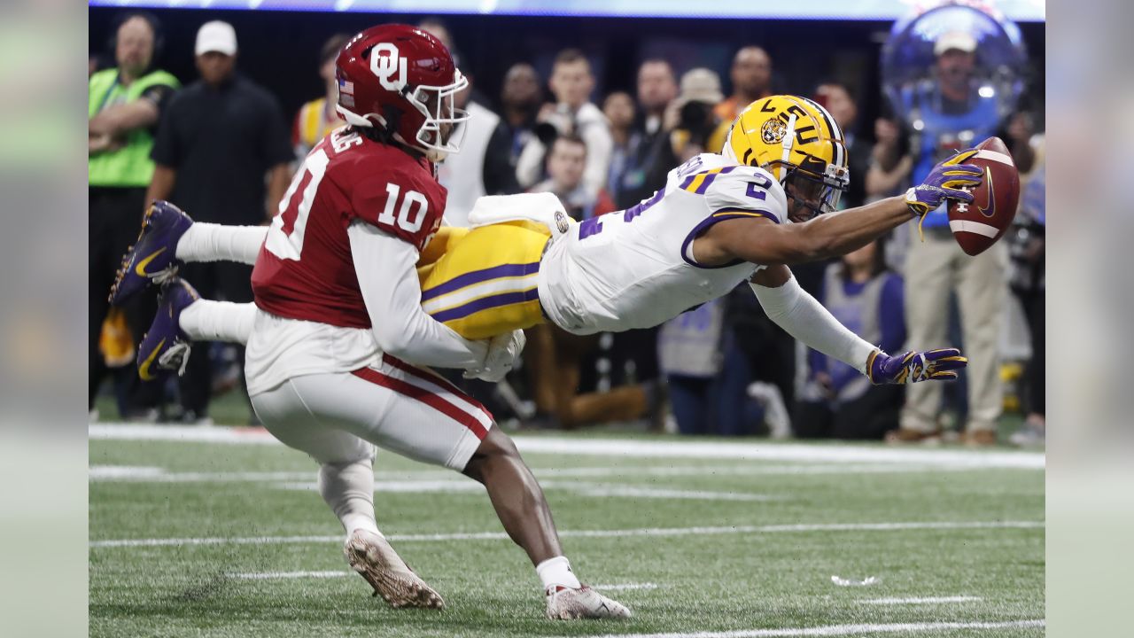 December 28, 2019: LSU wide receivers Justin Jefferson (2) and Terrace  Marshall Jr. (6) celebrate touchdown during NCAA Football game action  between the Oklahoma Sooners and the LSU Tigers at Mercedes-Benz Stadium