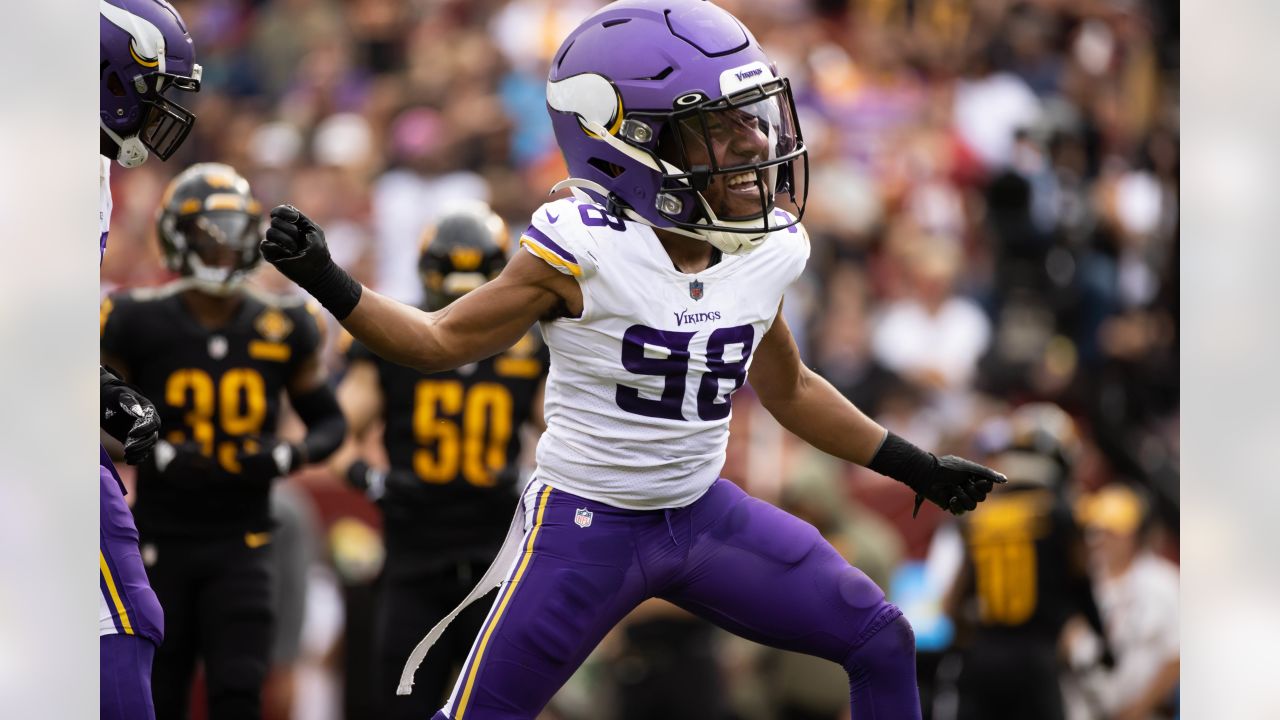 Minnesota Vikings cornerback Akayleb Evans (21) looks on before an