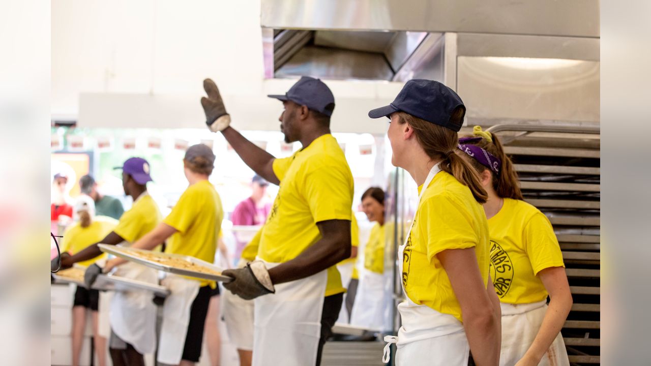 Beautiful Young Server in Minnesota Vikings Jersey Taking a Food Order ·  Creative Fabrica