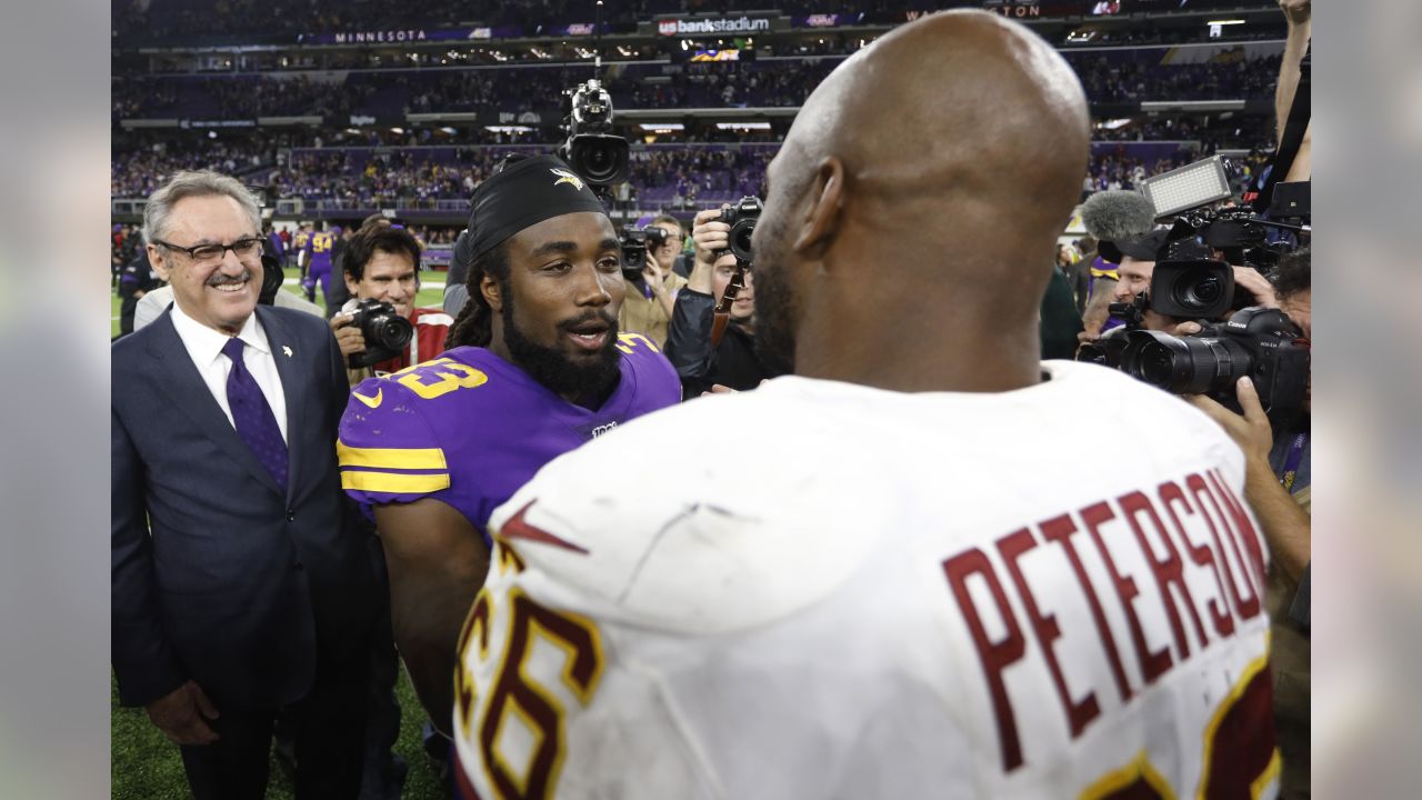 Fox sideline reporter Erin Andrews interviews Minnesota Vikings running  back Dalvin Cook, left, after an NFL football game against the Washington  Redskins, Thursday, Oct. 24, 2019, in Minneapolis. The Vikings won 19-9. (