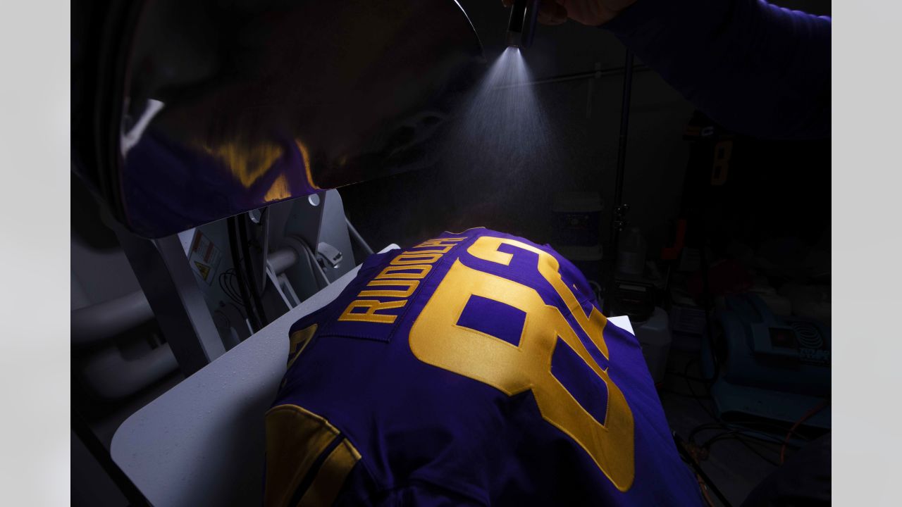 Equipment Staff Prepares Primetime Purple Jerseys for Vikings-Cowboys Game