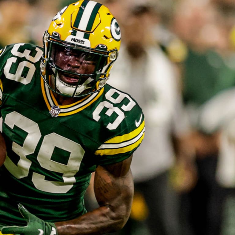 Green Bay Packers' Tyler Goodson runs during the first half of a