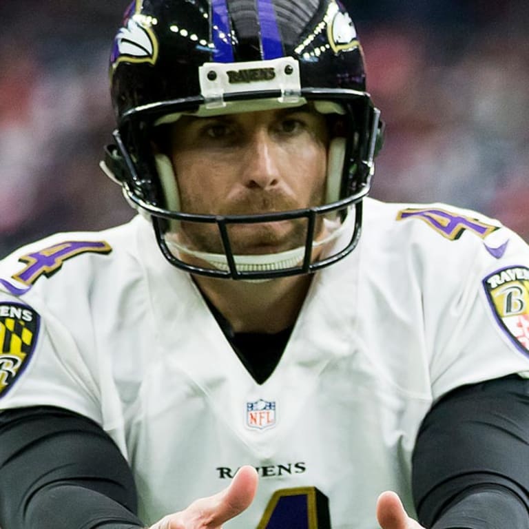 Baltimore Ravens defensive back Fish Smithson (46) and punter Sam Koch (4)  take the field during the team's Salute to Service prior to an NFL football  game against the Houston Texans, Sunday